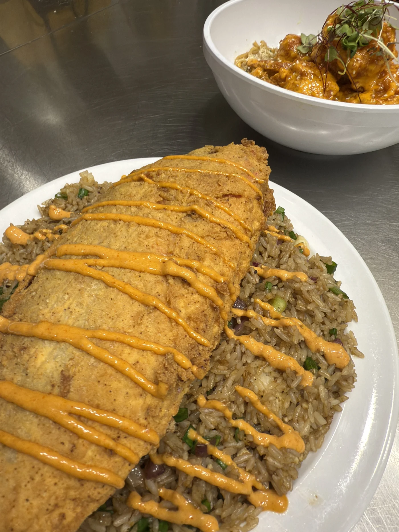 Snapper with jerk Thai fried rice and Boom Boom Shrimp garlic noodles